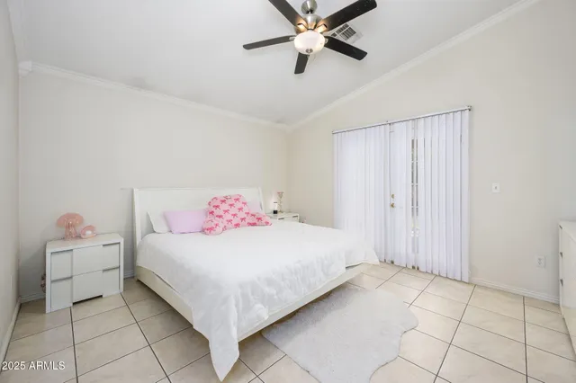 a bedroom with a bed and a cabinets