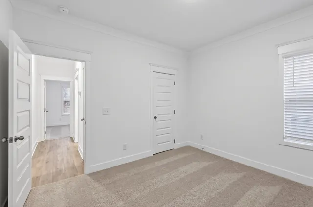 an empty room with windows