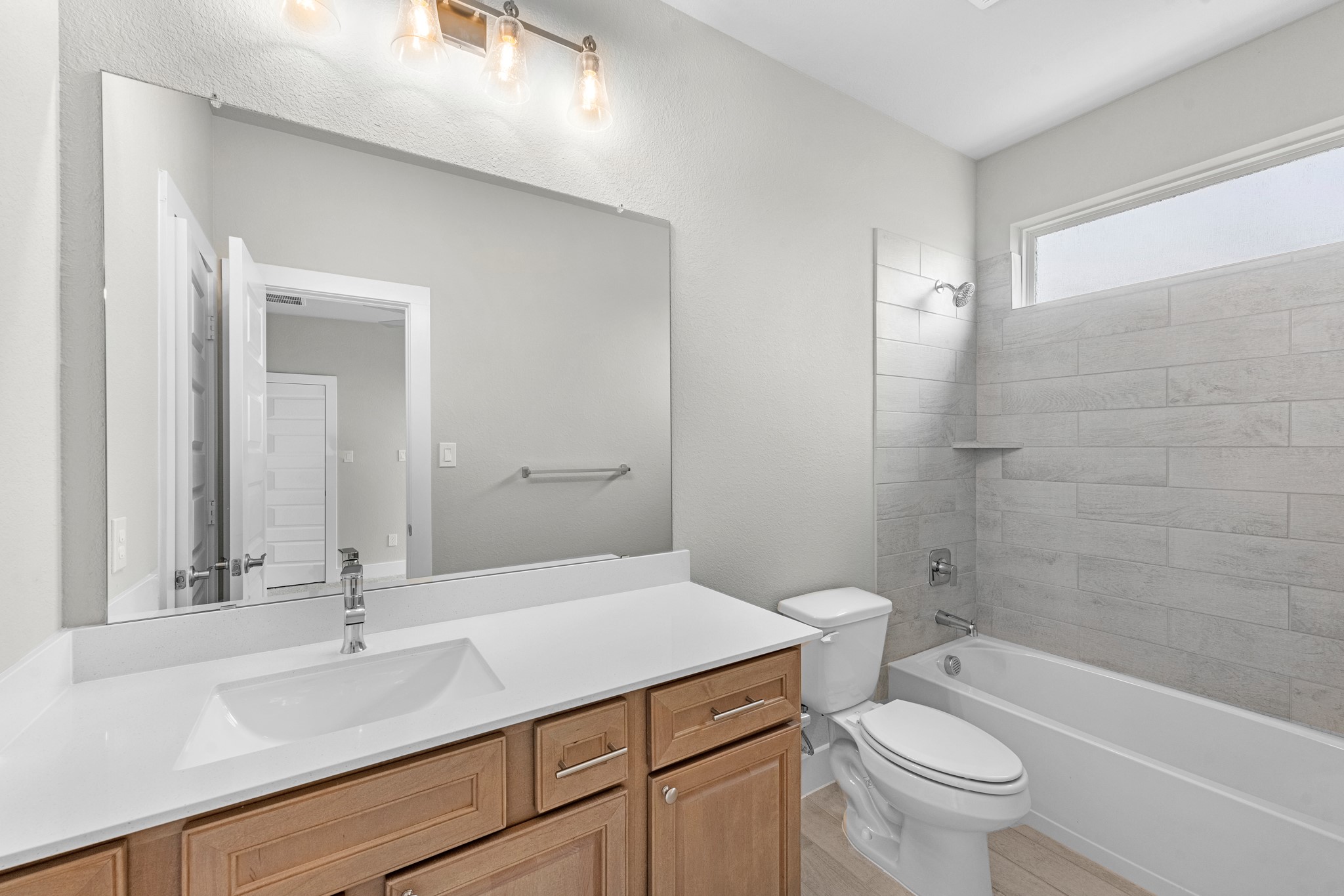 3410 Everglade Lane Rosenberg, TX 77471 - Photo 12 of 39 a bathroom with a sink a toilet and shower
