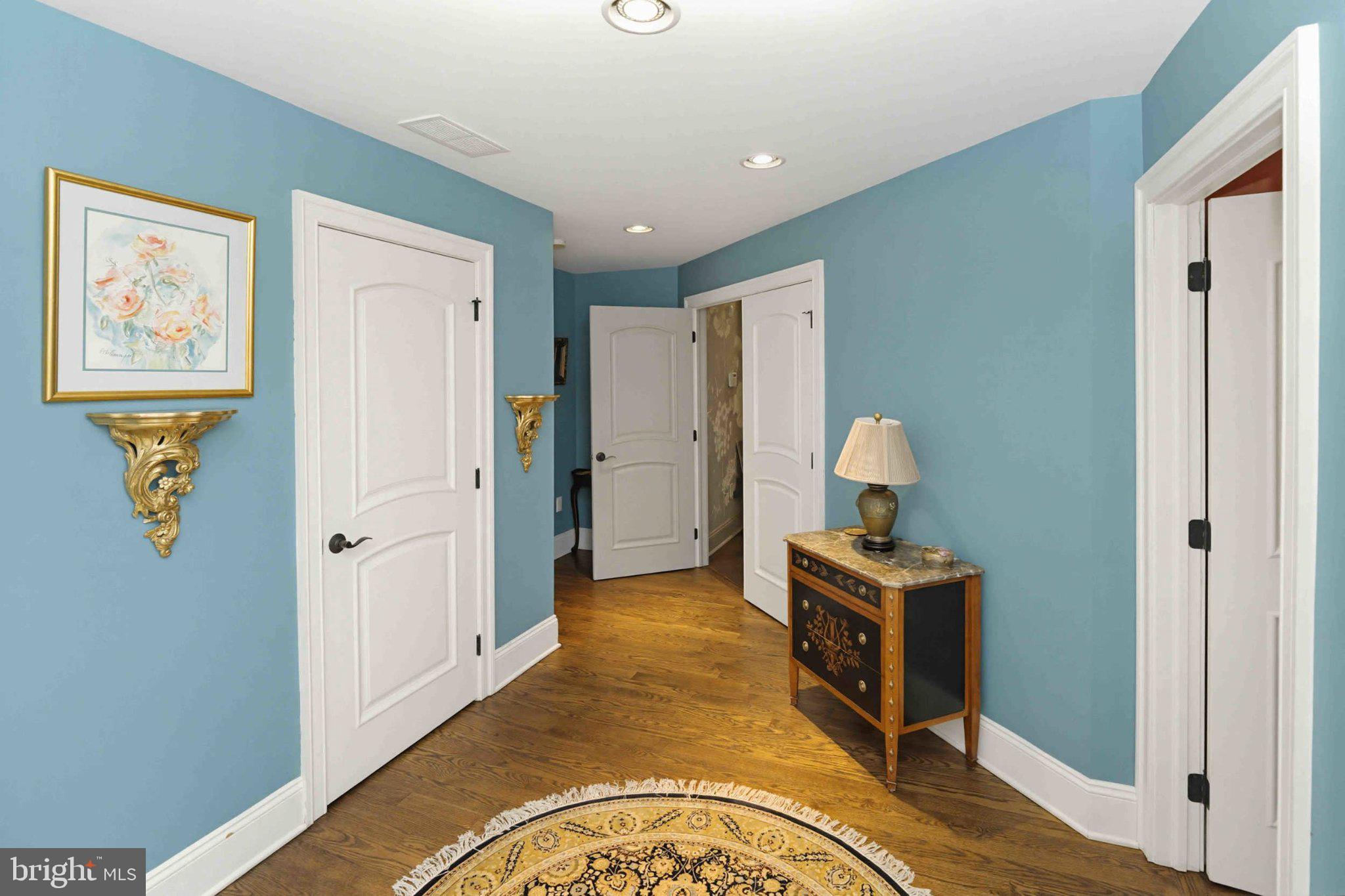 2244 Deer Path Road Huntingdon Valley, PA 19006 - Photo 14 of 95 Charming hallway with serene blue hues.