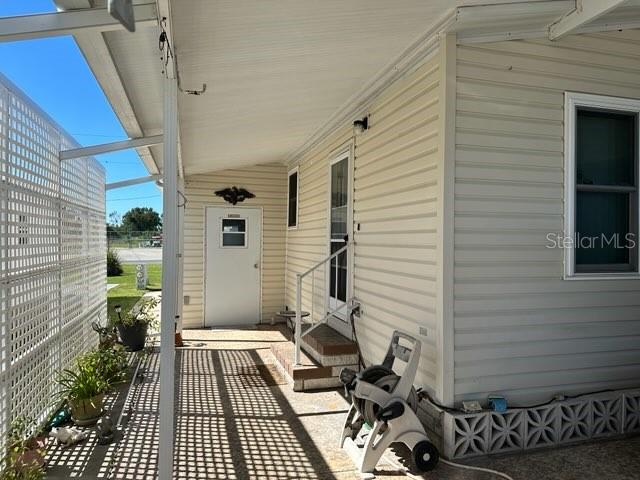 359 Pine Loop Frostproof, FL 33843 - Photo 19 of 31 a view of a house with sitting area
