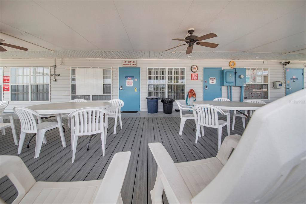 359 Pine Loop Frostproof, FL 33843 - Photo 28 of 31 a view of a dining room with furniture window and wooden floor