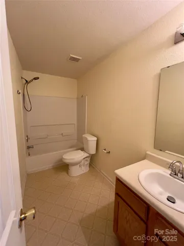 a view of small space with racks on the wall