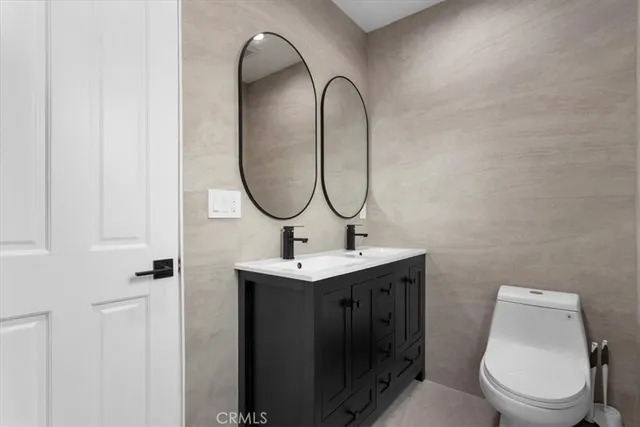 a bathroom with a shower and a toilet