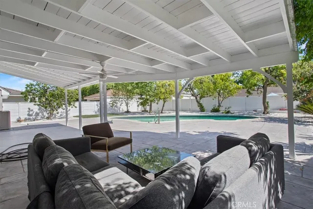 a view of a house with a yard porch and sitting area