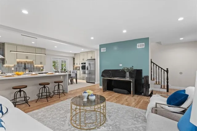 a living room with furniture and a table