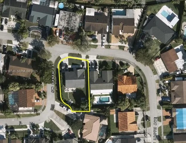 a kitchen with stainless steel appliances kitchen island granite countertop a sink a stove and cabinets