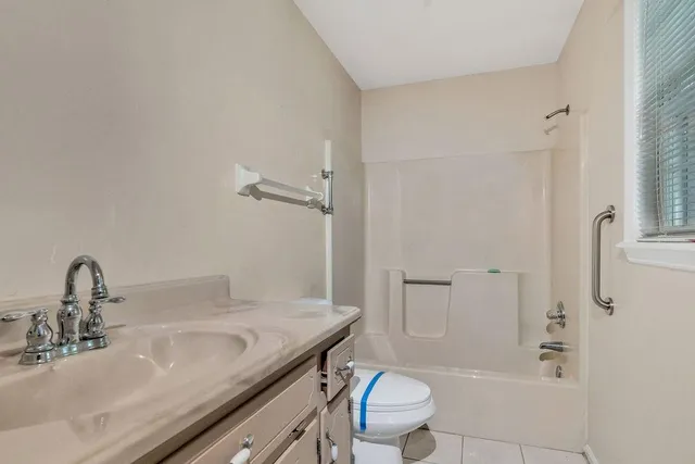 a view of a chairs and table on the deck