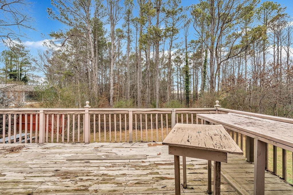 5800 Yellow Creek Road Murrayville, GA 30564 - Photo 20 of 33 a view of a chairs and table on the deck