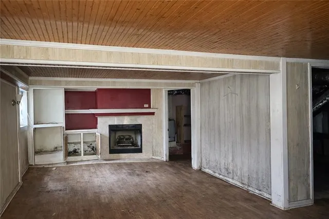 a spacious bathroom with a sink a toilet and shower