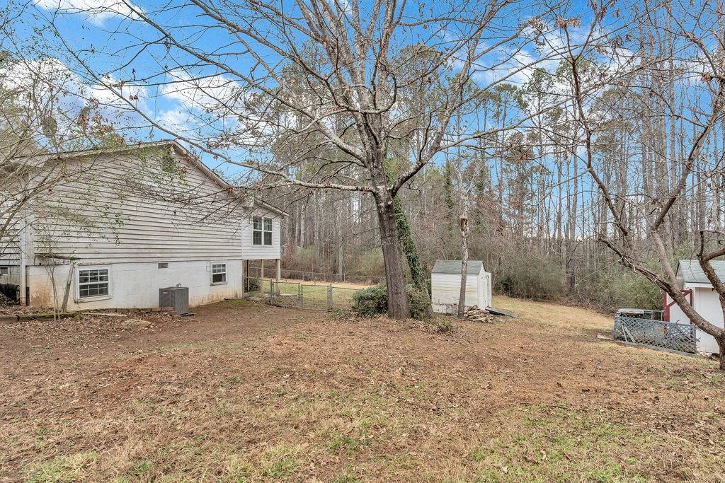 5800 Yellow Creek Road Murrayville, GA 30564 - Photo 28 of 33 a view of a house with a snow in the yard