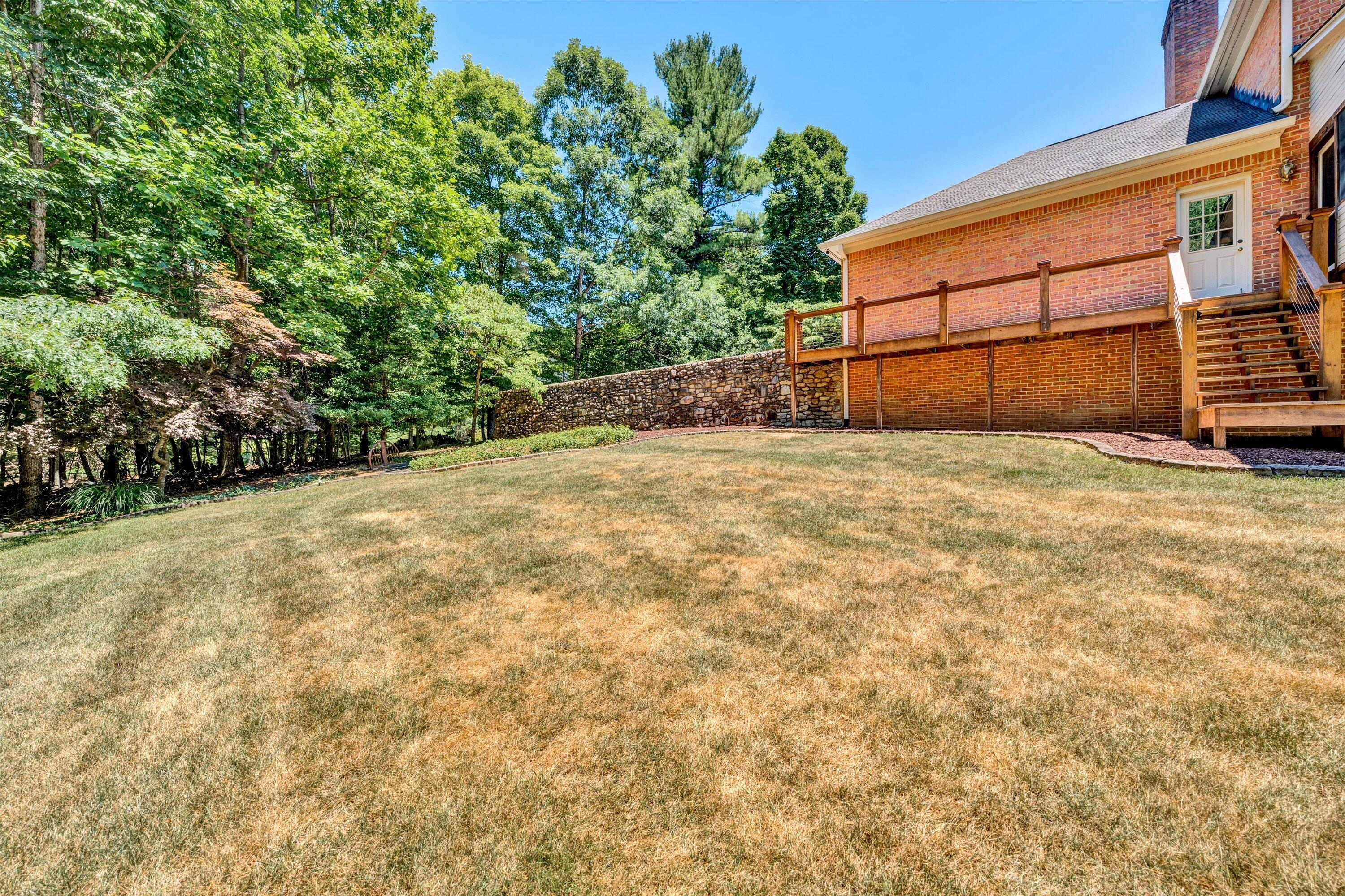 6378 Spring Run Drive Roanoke, VA 24018 - Photo 46 of 51 Rear View of Yard & Stone Wall