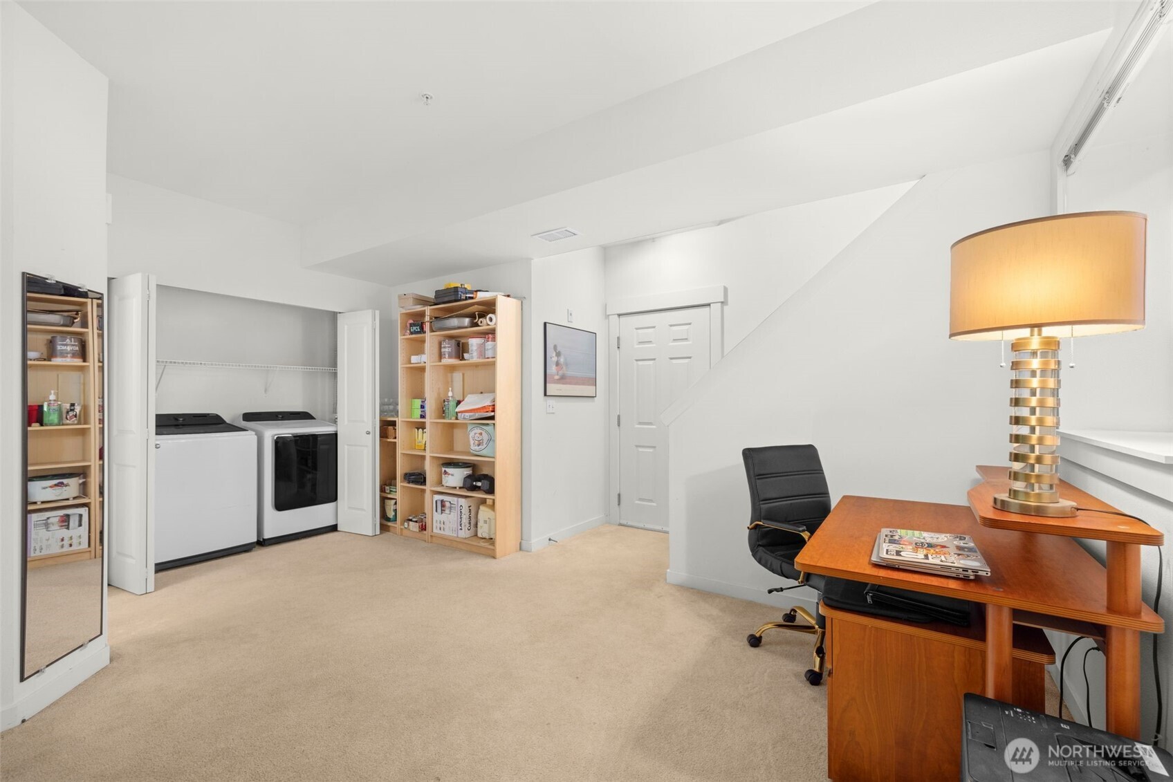 23120 Southeast Black Nugget Road, Unit E1 Issaquah, WA 98029 - Photo 26 of 39 a workspace with furniture and closet