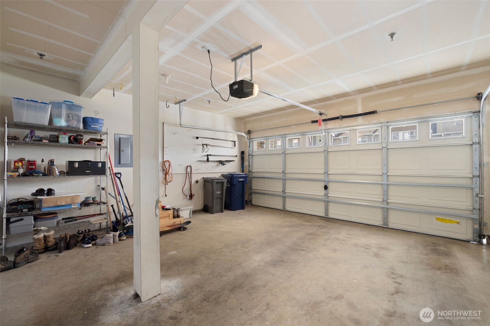 23120 Southeast Black Nugget Road, Unit E1 Issaquah, WA 98029 - Photo 34 of 39 a view of a garage with storage