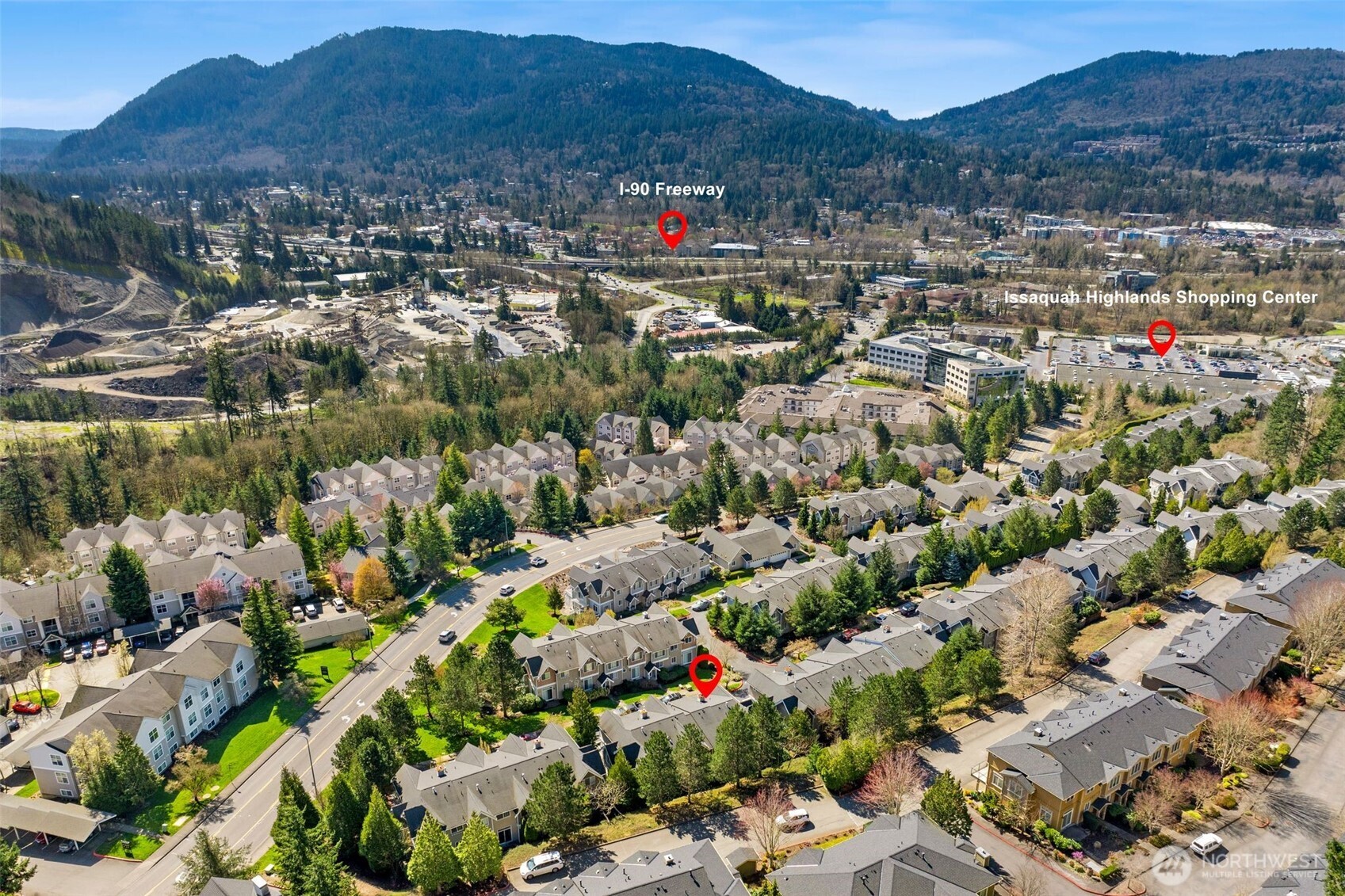23120 Southeast Black Nugget Road, Unit E1 Issaquah, WA 98029 - Photo 38 of 39 an aerial view of residential houses and lake