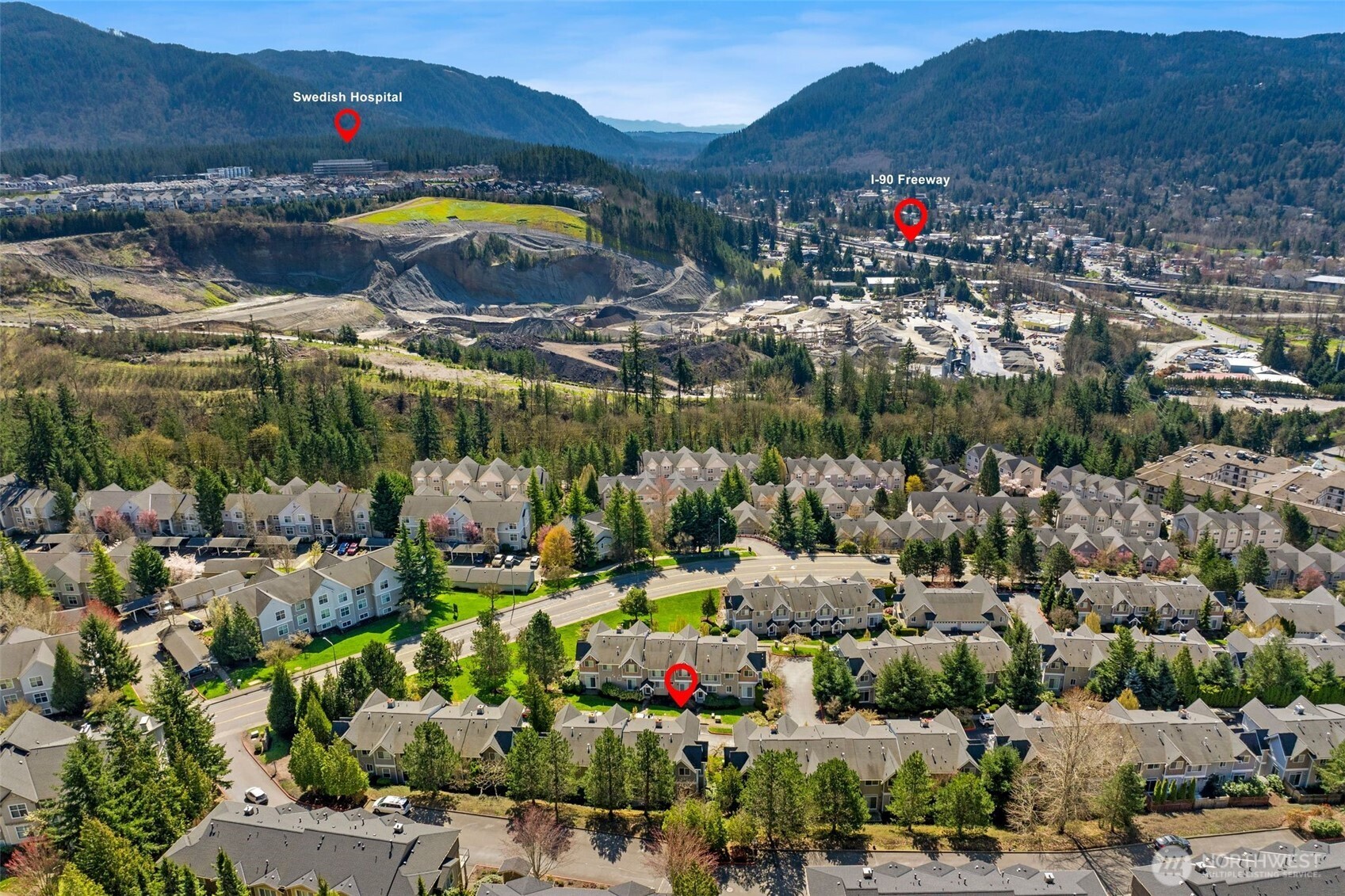 23120 Southeast Black Nugget Road, Unit E1 Issaquah, WA 98029 - Photo 39 of 39 a view of lake and mountain