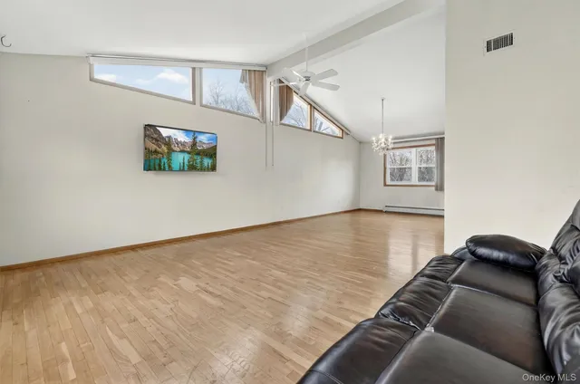 a view of a livingroom with a flat screen tv