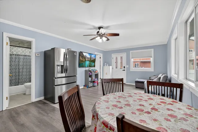 a bedroom with a bed and a dresser in it