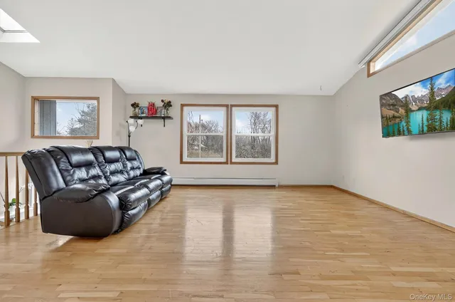 a view of livingroom with furniture and window