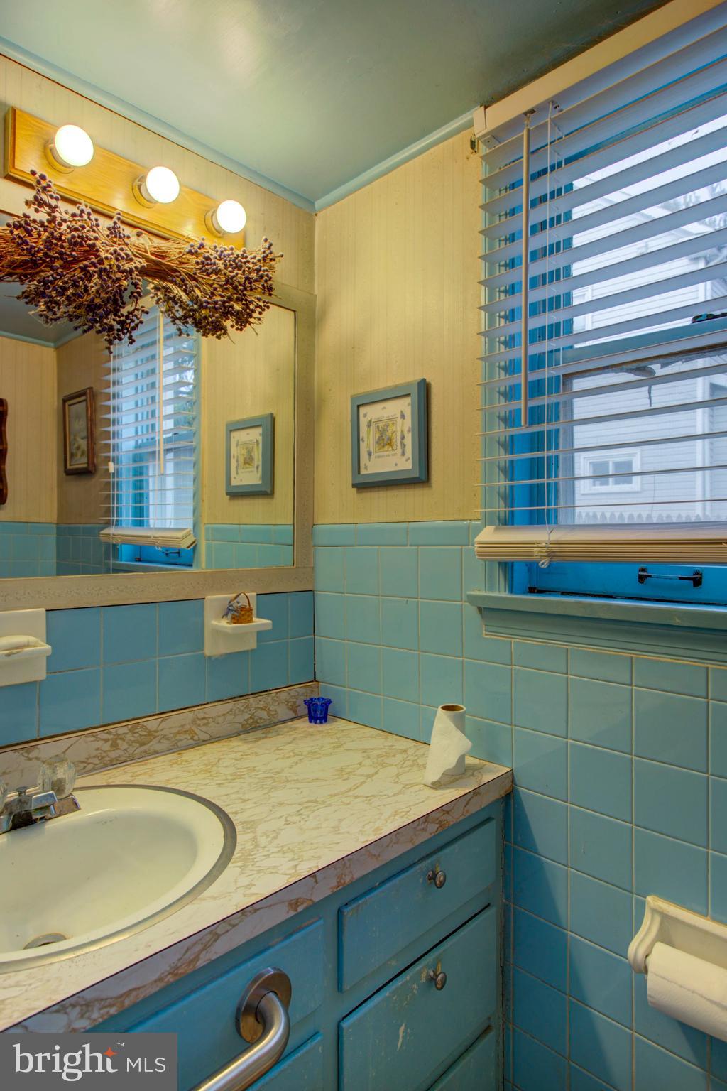 193 Cochran Street Cochranville, PA 19330 - Photo 23 of 57 a bathroom with a sink and a mirror