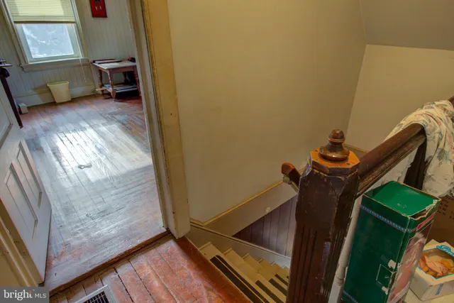 a bed room with furniture and a window