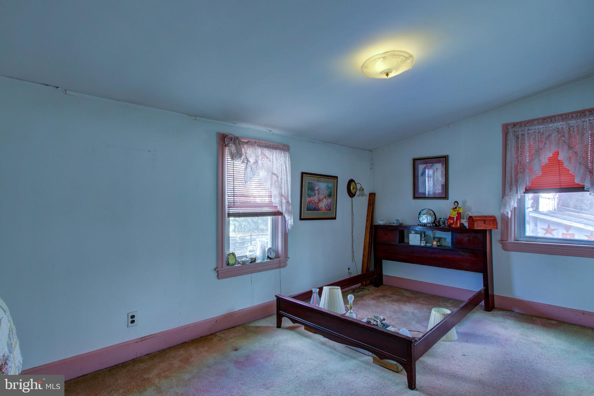 193 Cochran Street Cochranville, PA 19330 - Photo 30 of 57 a living room with furniture and a window