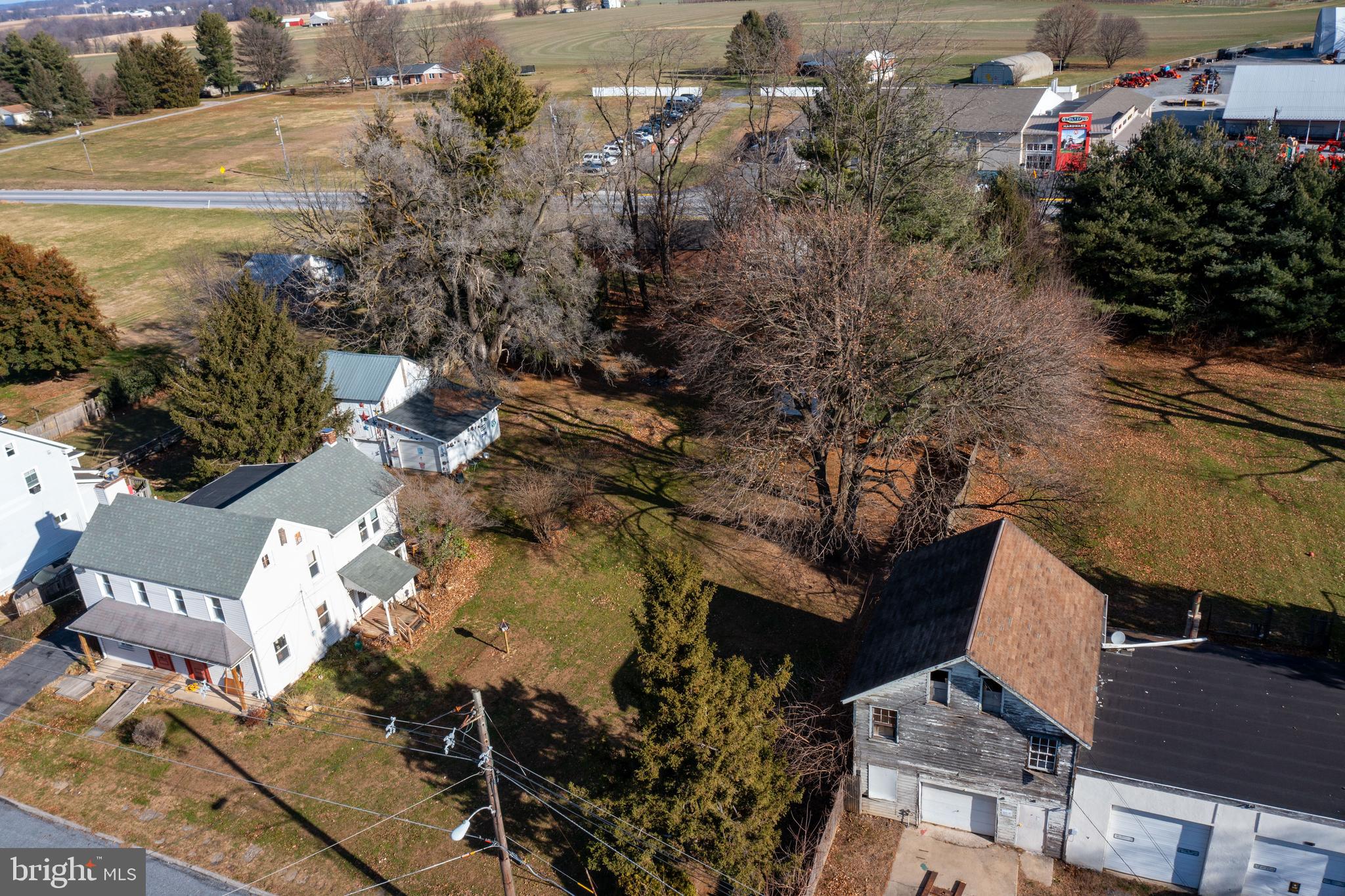 193 Cochran Street Cochranville, PA 19330 - Photo 3 of 57 an aerial view of a house with a yard basket ball court and outdoor seating
