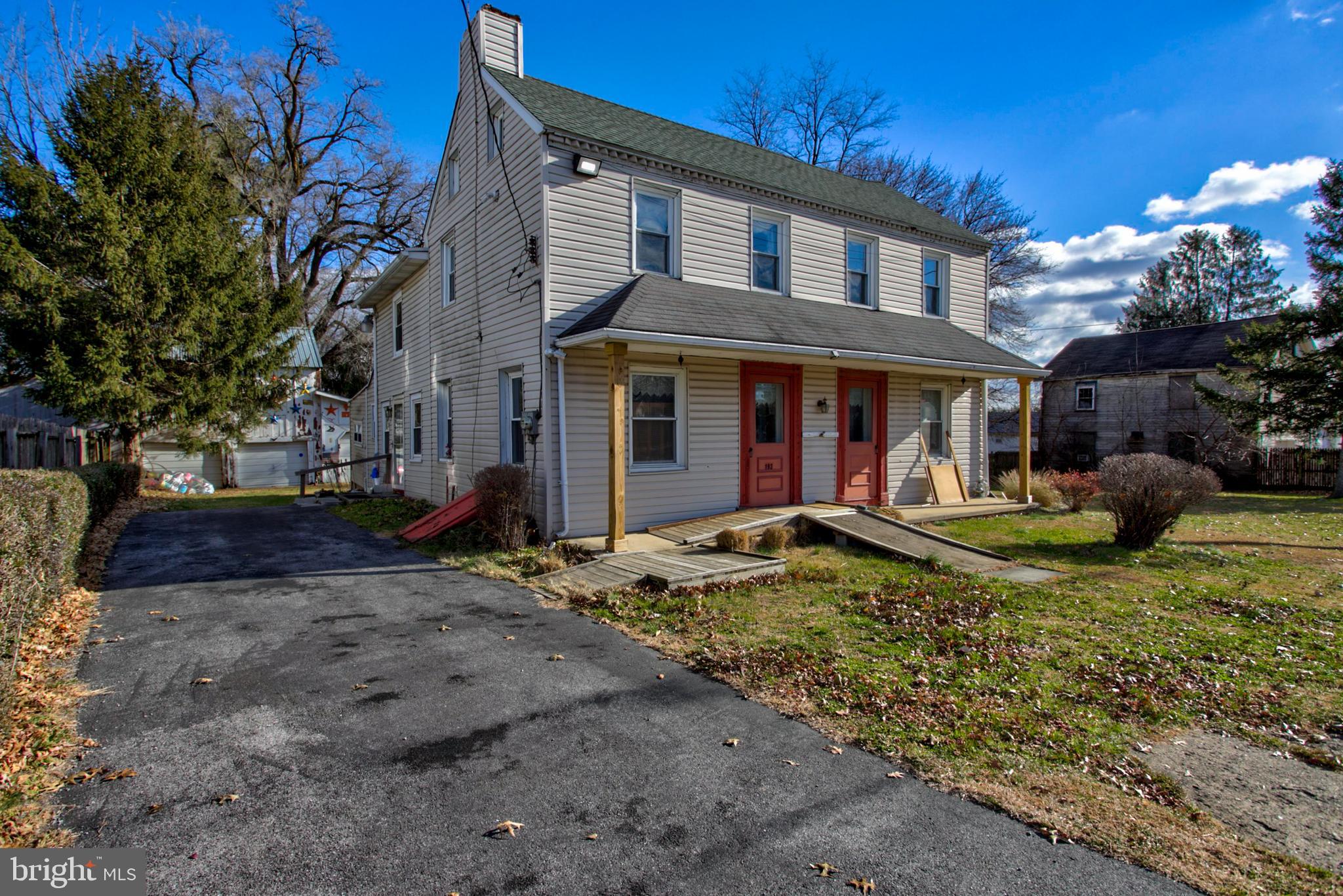 193 Cochran Street Cochranville, PA 19330 - Photo 43 of 57 a front view of a house with garden