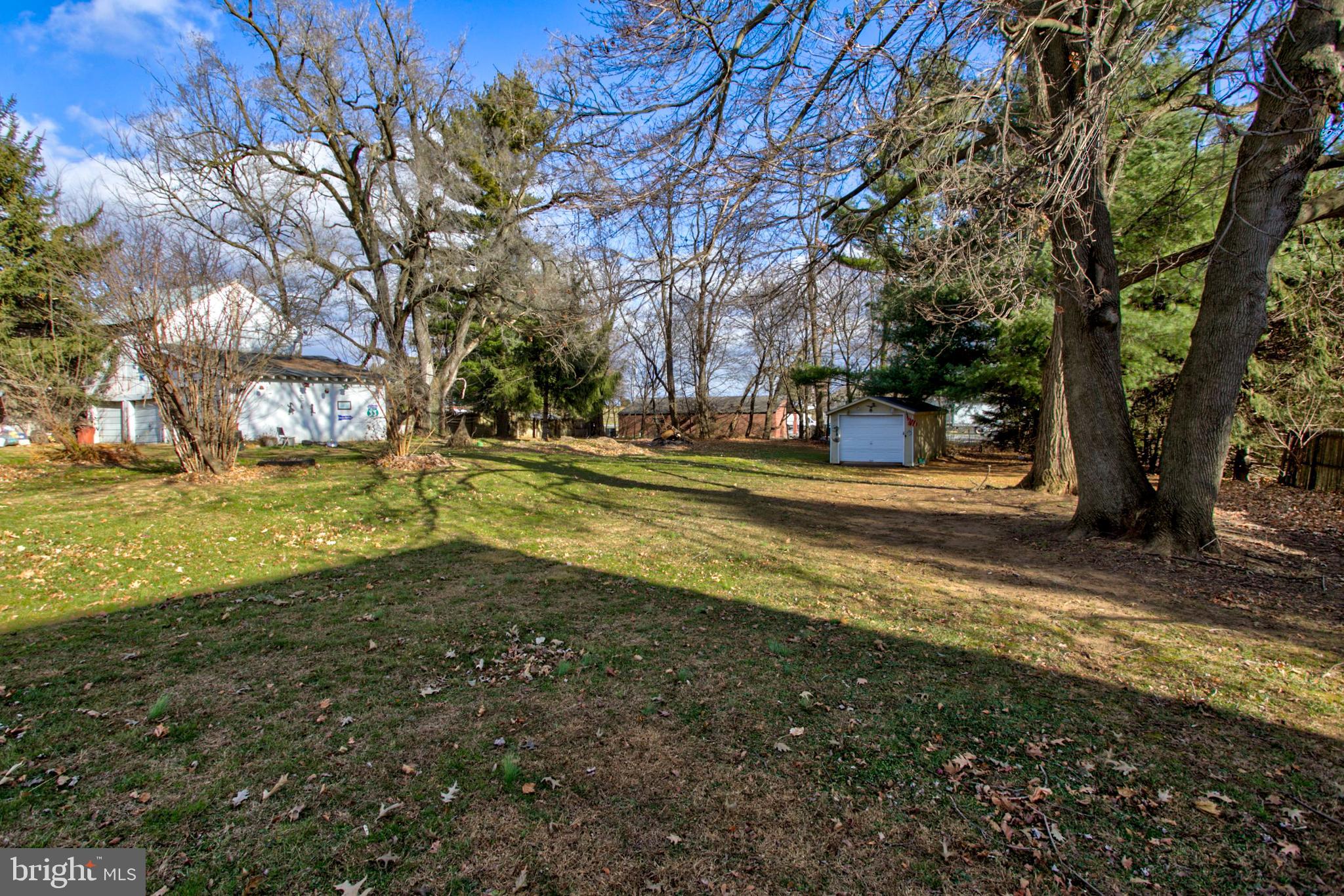 193 Cochran Street Cochranville, PA 19330 - Photo 48 of 57 a view of a yard with large trees
