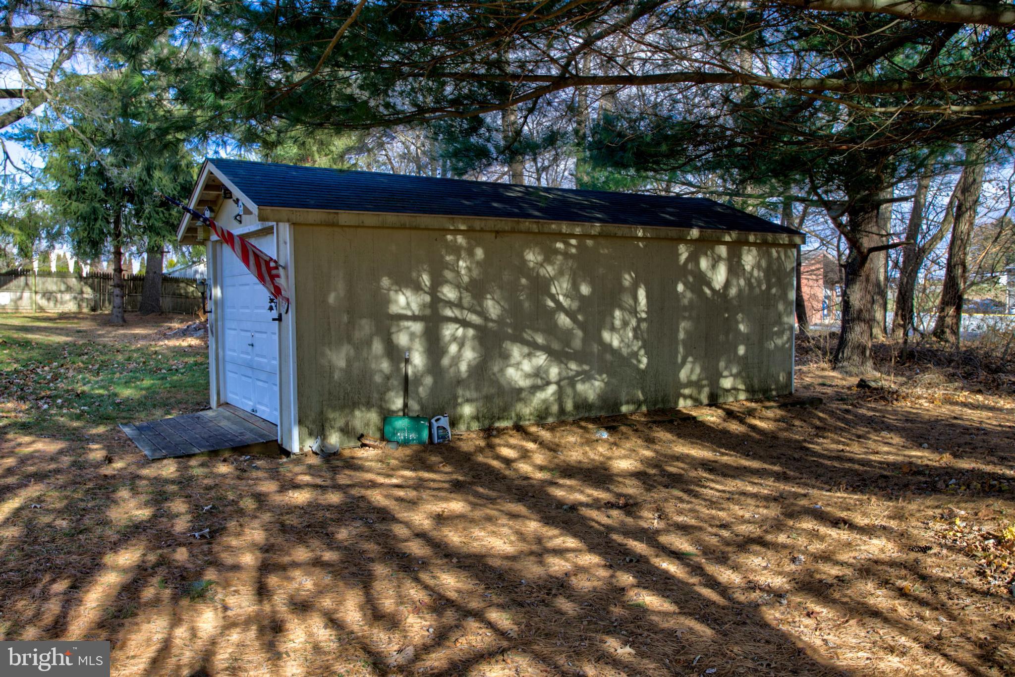 193 Cochran Street Cochranville, PA 19330 - Photo 50 of 57 a view of a wooden house with a yard