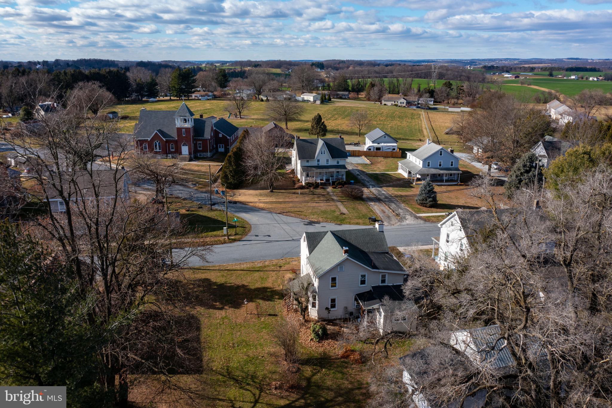193 Cochran Street Cochranville, PA 19330 - Photo 7 of 57 a view of a lake with lawn chairs