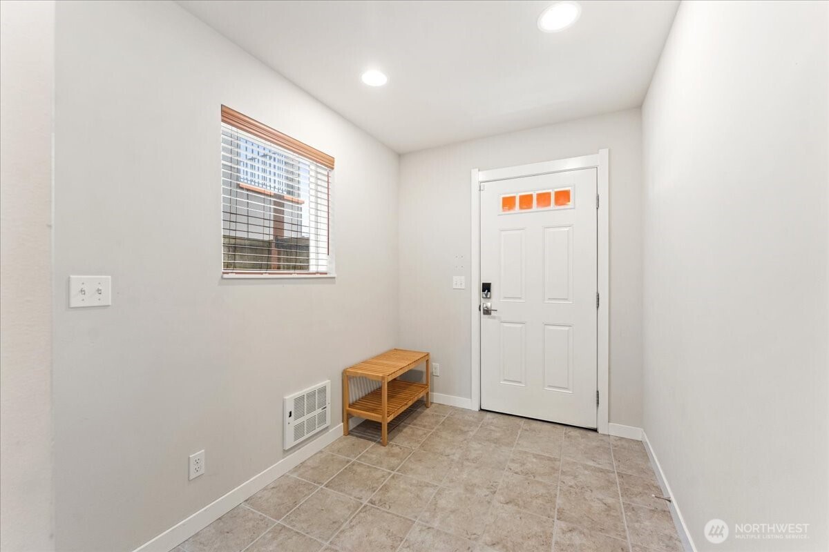 12418 2nd Place Southwest Burien, WA 98146 - Photo 30 of 39 a view of room with furniture and window