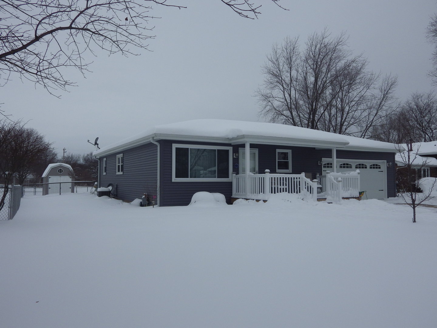 813 Southgate Road New Lenox, IL 60451 - Photo 1 of 17 a backyard of a house with yard and outdoor seating