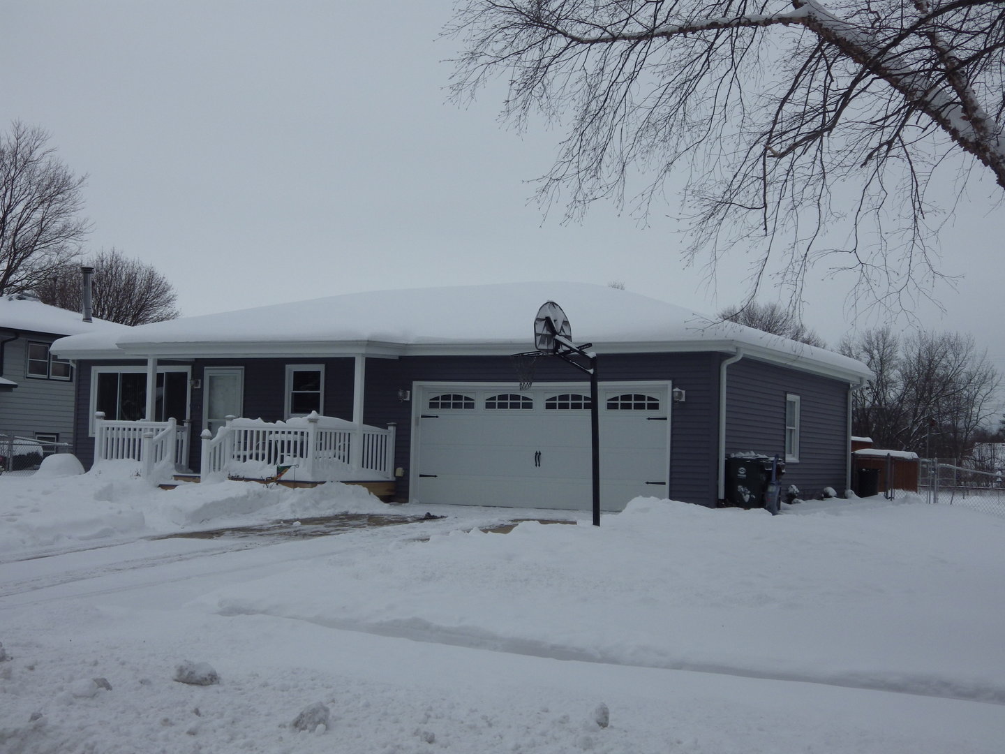 813 Southgate Road New Lenox, IL 60451 - Photo 2 of 17 a view of a house with a snow in the yard