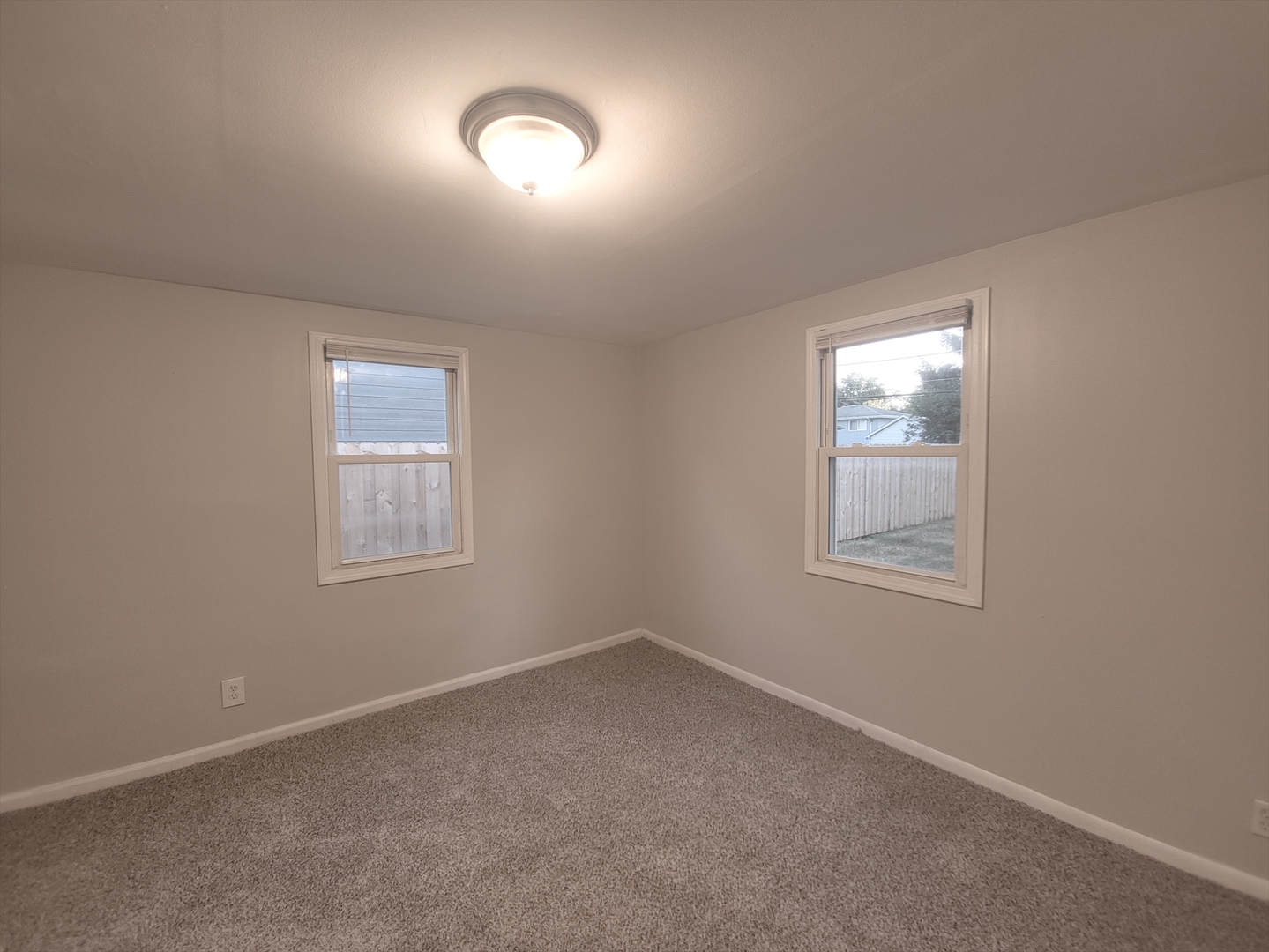 14610 Sawyer Avenue Midlothian, IL 60445 - Photo 12 of 18 an empty room with a window