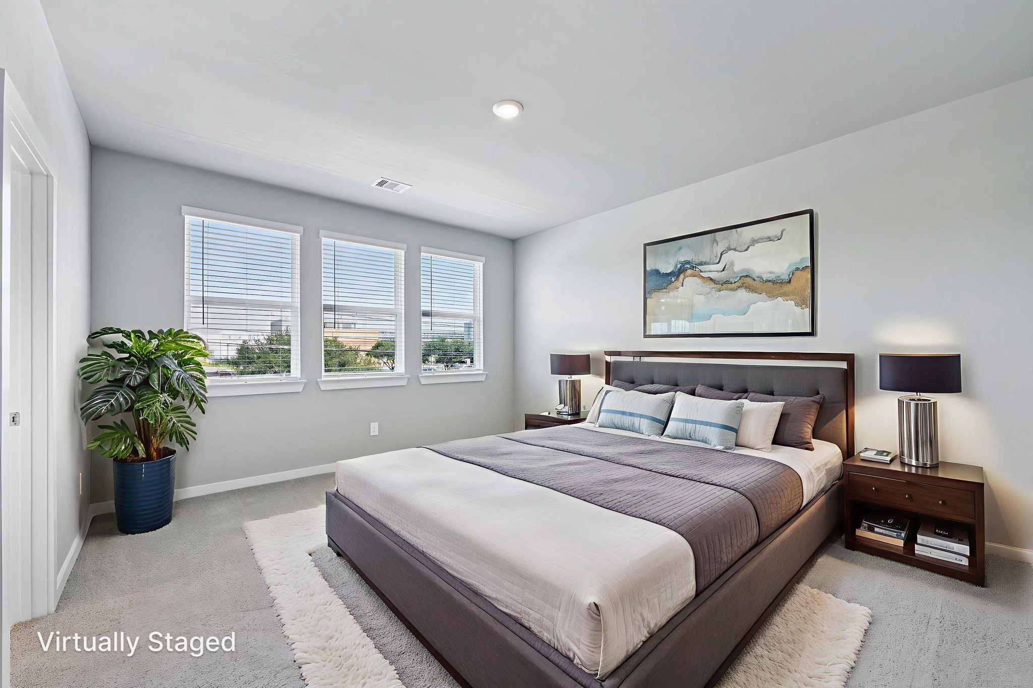 10032 Rustic Charm Street Houston, TX 77080 - Photo 22 of 40 a bedroom with a bed and a potted plant