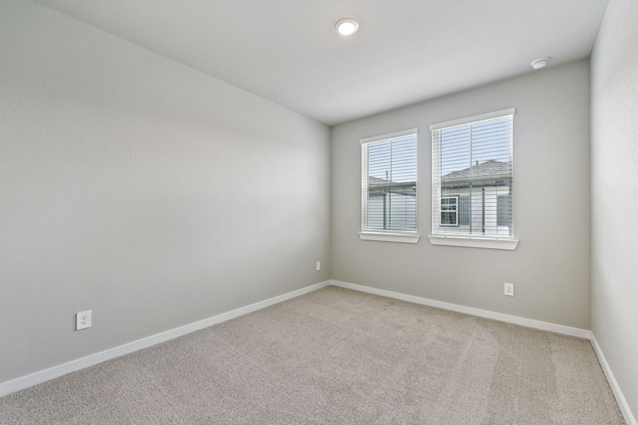10032 Rustic Charm Street Houston, TX 77080 - Photo 32 of 40 an empty room with windows