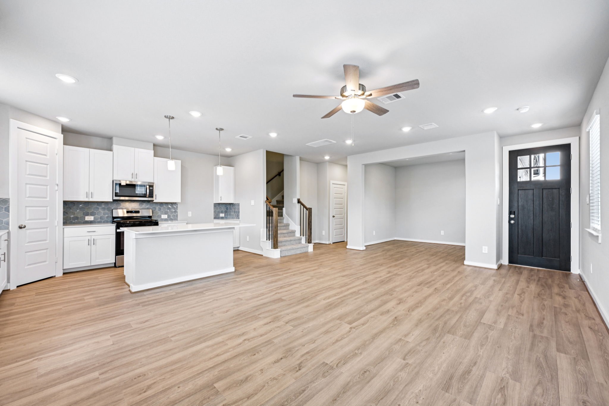 10032 Rustic Charm Street Houston, TX 77080 - Photo 4 of 40 a view of kitchen with granite countertop cabinets and refrigerator