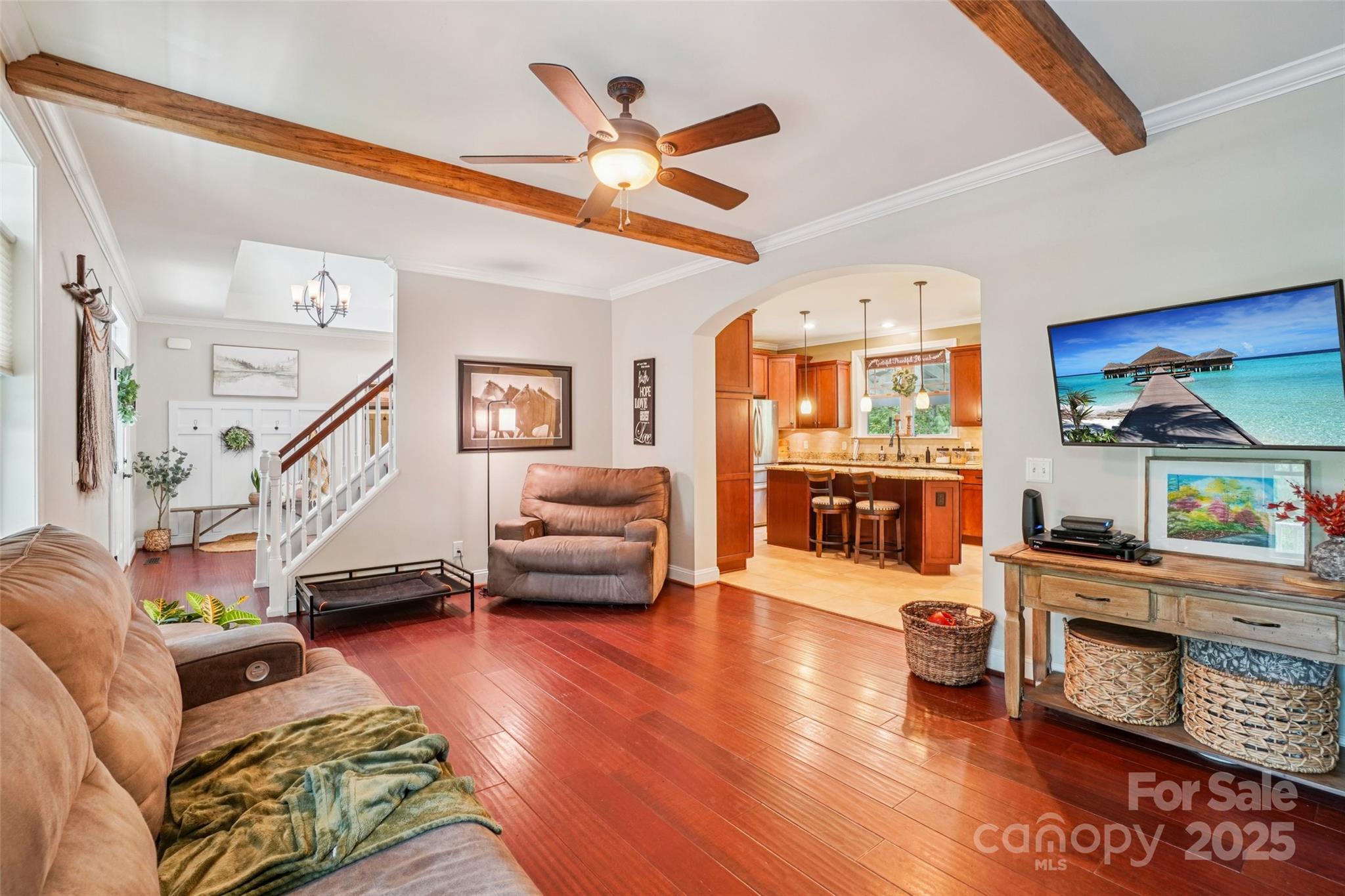 813 Beech Tree Place Hendersonville, NC 28792 - Photo 11 of 46 a living room with furniture and a wooden floor