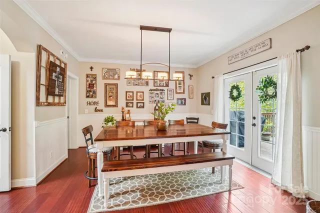 a view of a room with furniture and window