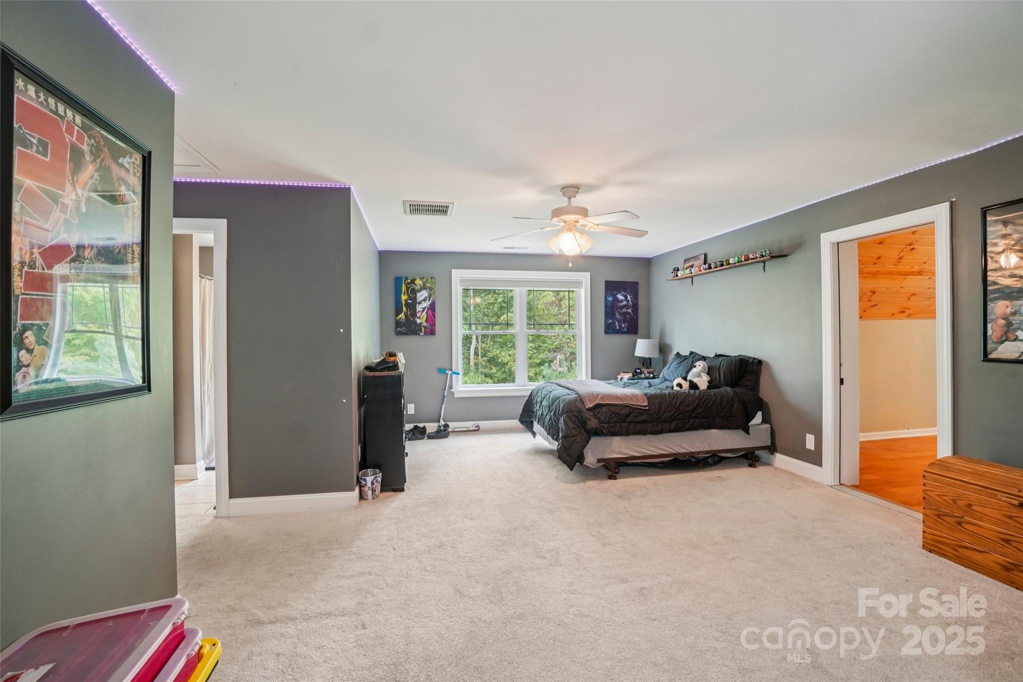 813 Beech Tree Place Hendersonville, NC 28792 - Photo 26 of 46 a bedroom with furniture and a window