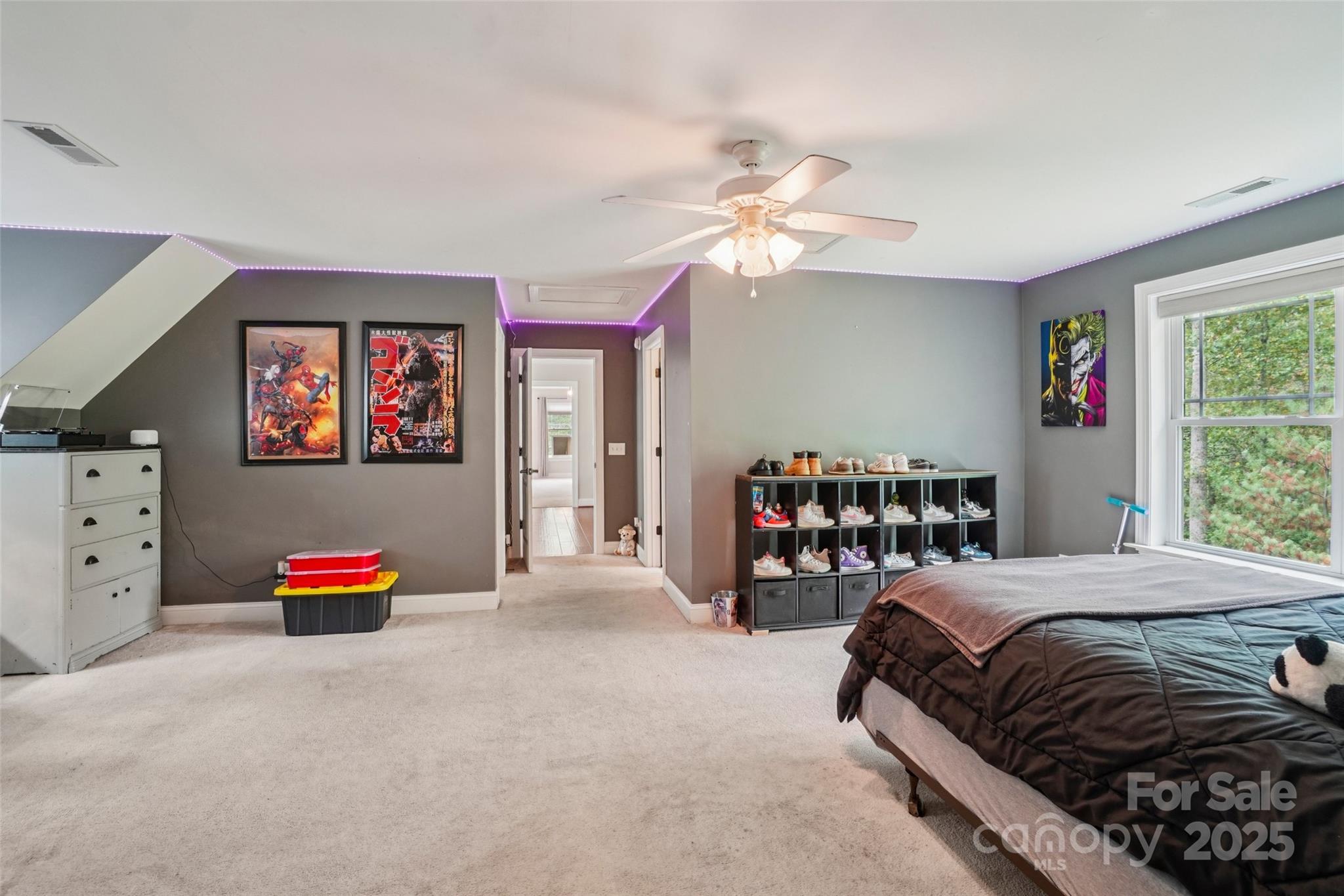 813 Beech Tree Place Hendersonville, NC 28792 - Photo 27 of 46 a bedroom with a bed and dresser