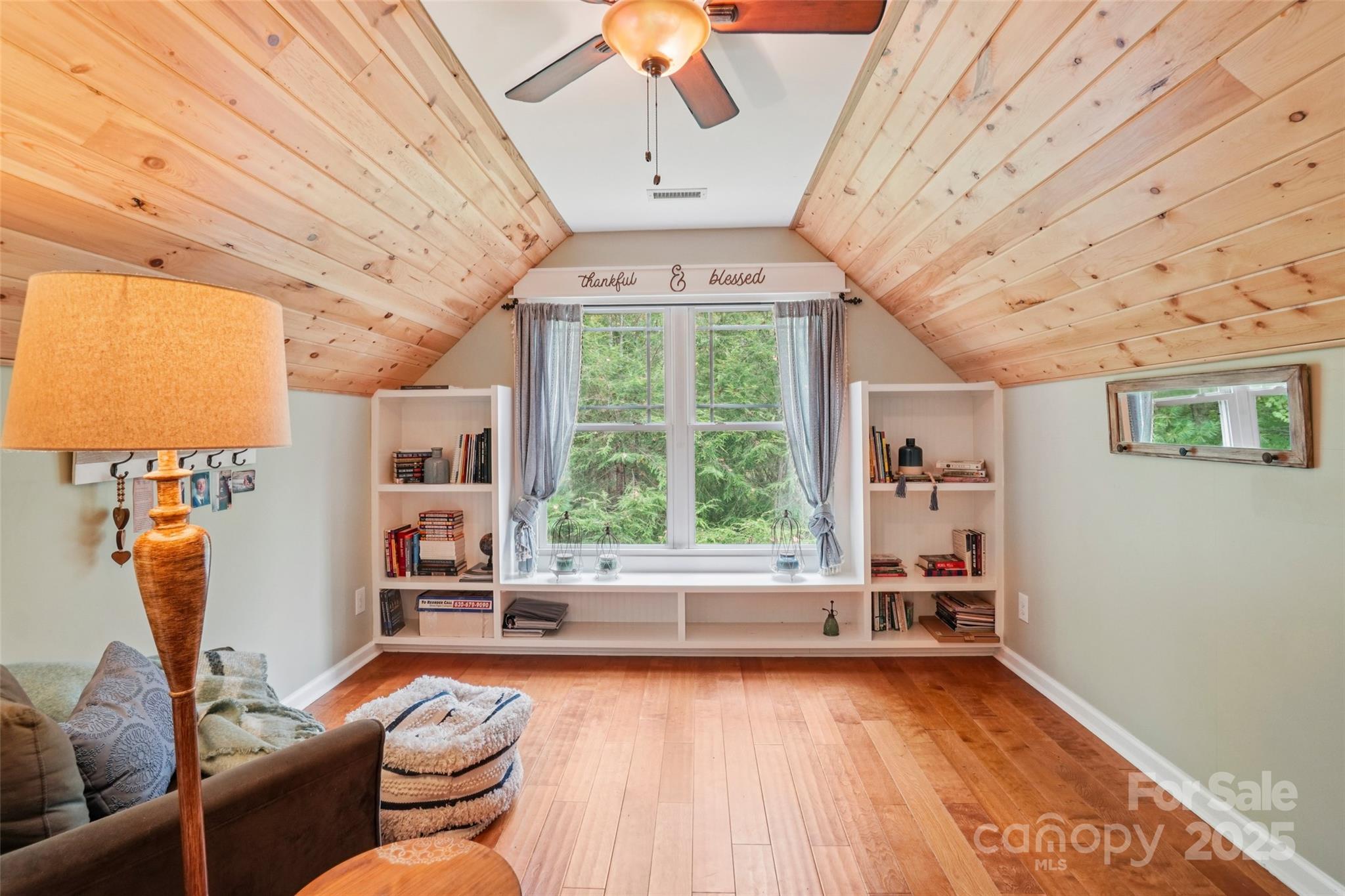 813 Beech Tree Place Hendersonville, NC 28792 - Photo 29 of 46 a living room with furniture and a large window