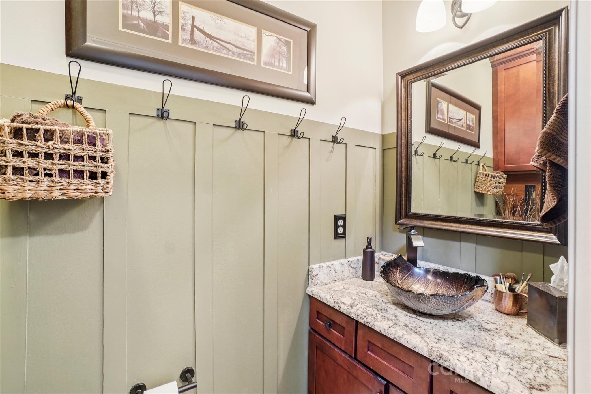 813 Beech Tree Place Hendersonville, NC 28792 - Photo 33 of 46 a bathroom with a granite countertop sink and a window
