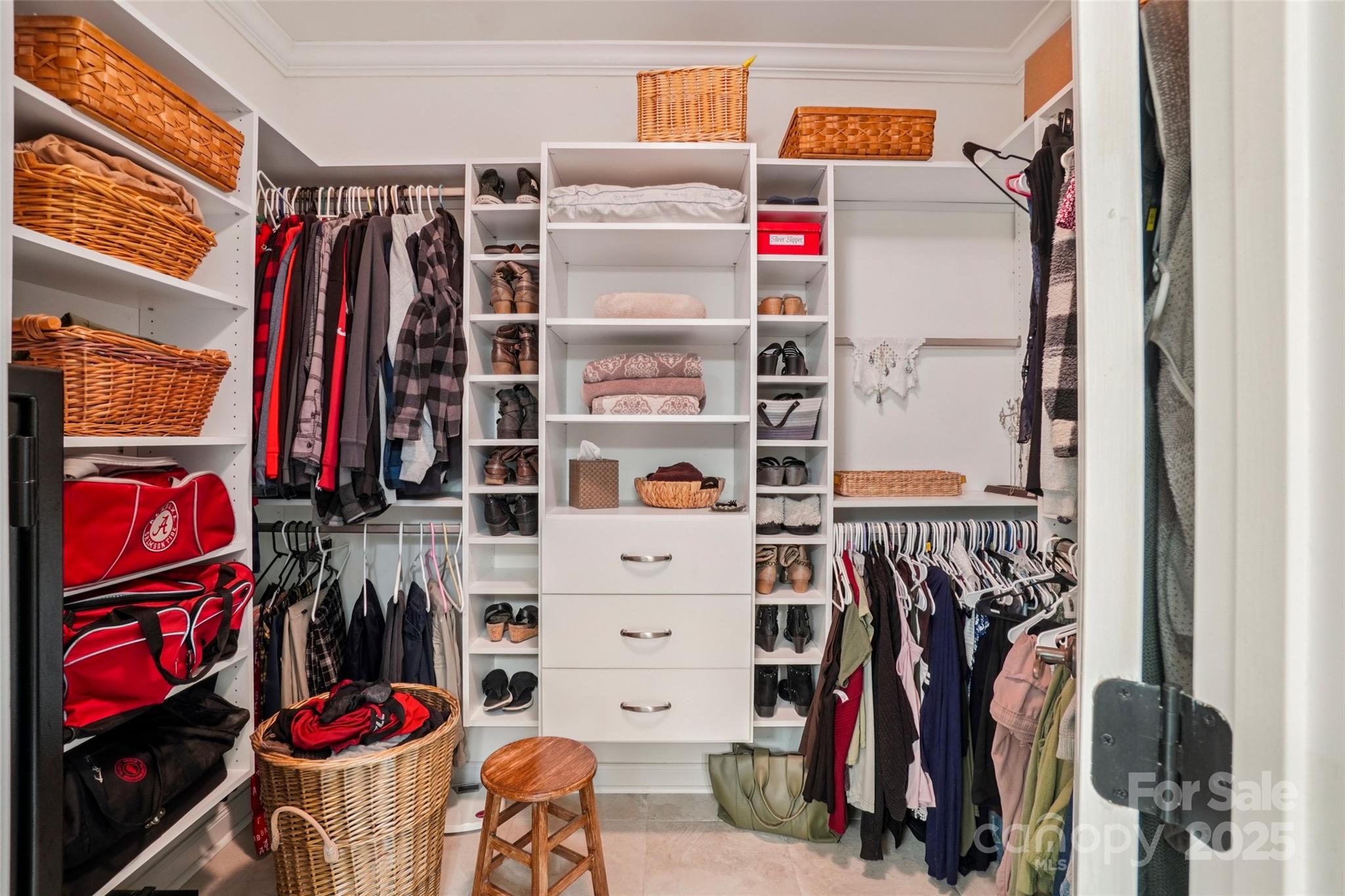 813 Beech Tree Place Hendersonville, NC 28792 - Photo 39 of 46 a view of walk in closet with clothes
