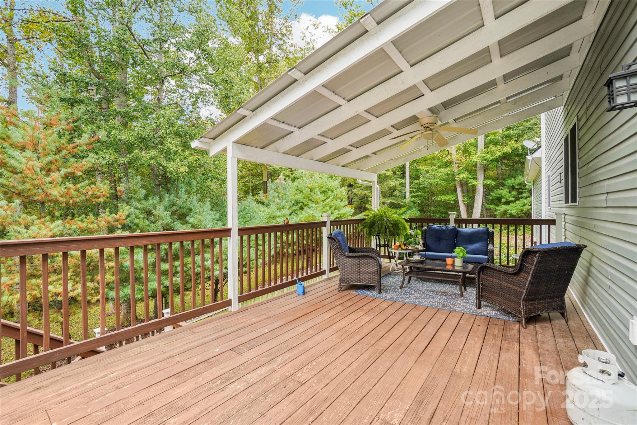 813 Beech Tree Place Hendersonville, NC 28792 - Photo 41 of 46 a view of roof deck with furniture and wooden floor