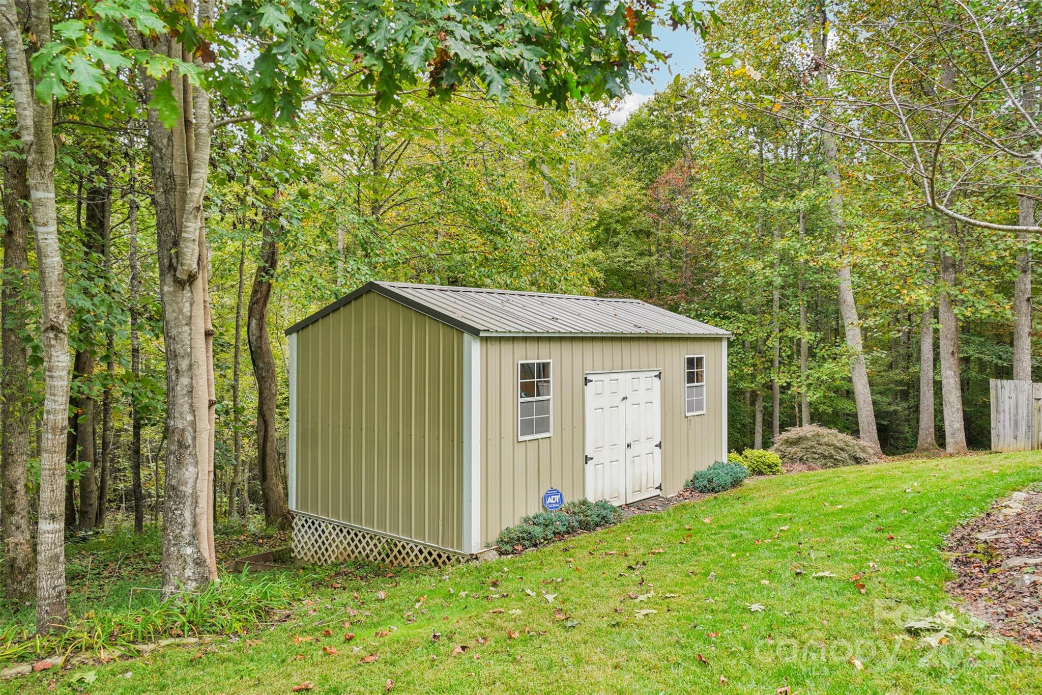 813 Beech Tree Place Hendersonville, NC 28792 - Photo 43 of 46 a backyard of a house with lots of green space