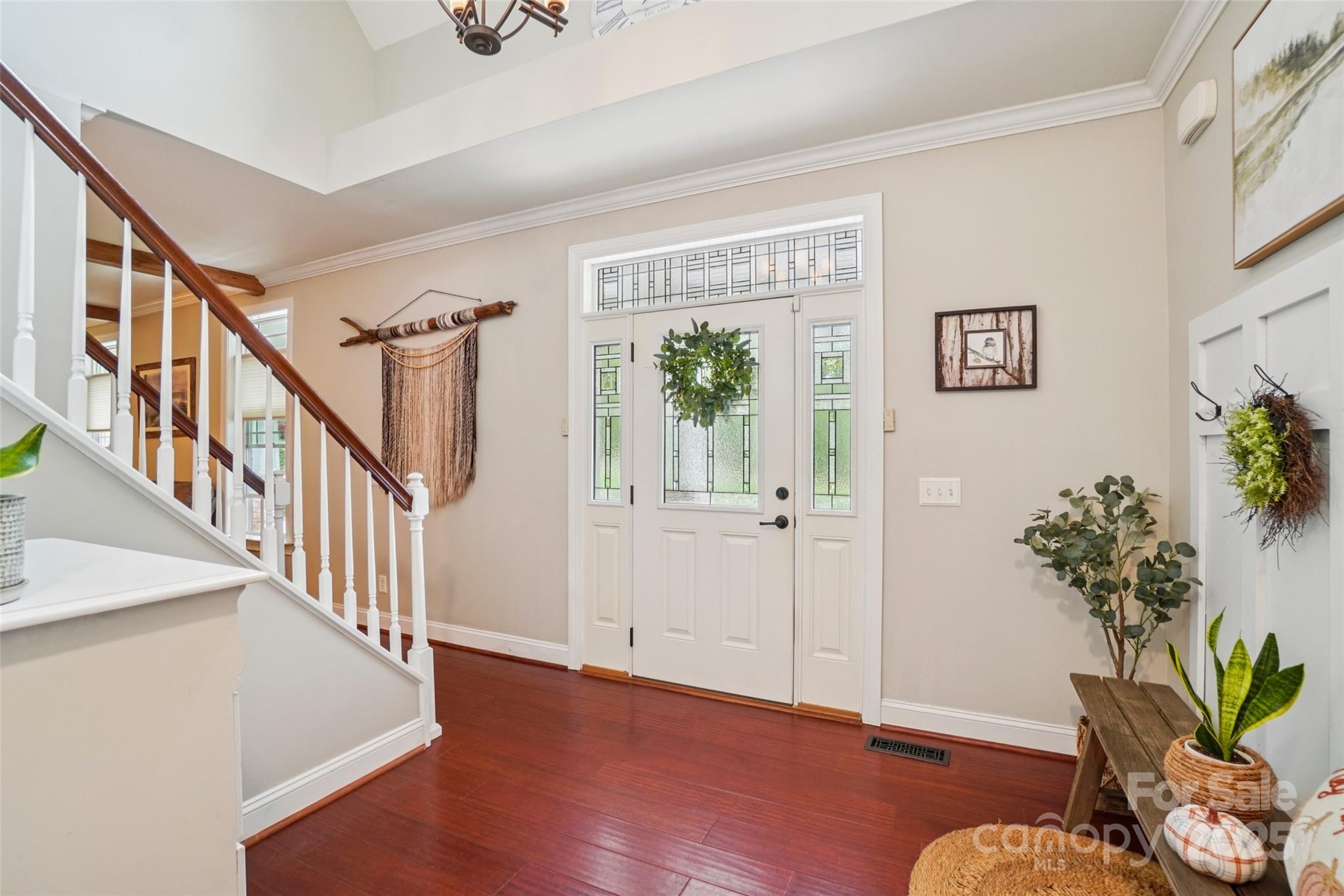813 Beech Tree Place Hendersonville, NC 28792 - Photo 7 of 46 a view of an entryway with wooden floor