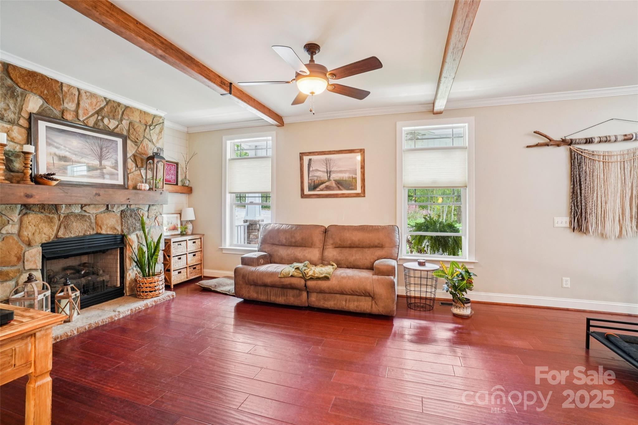 813 Beech Tree Place Hendersonville, NC 28792 - Photo 10 of 46 a living room with furniture and a fireplace