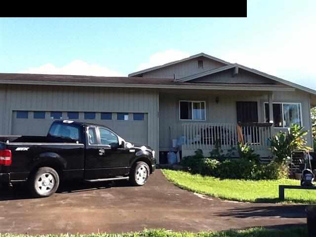 944 Kokomo Road Haiku, HI 96708 - Photo 1 of 11 a view of a car parked front of a house